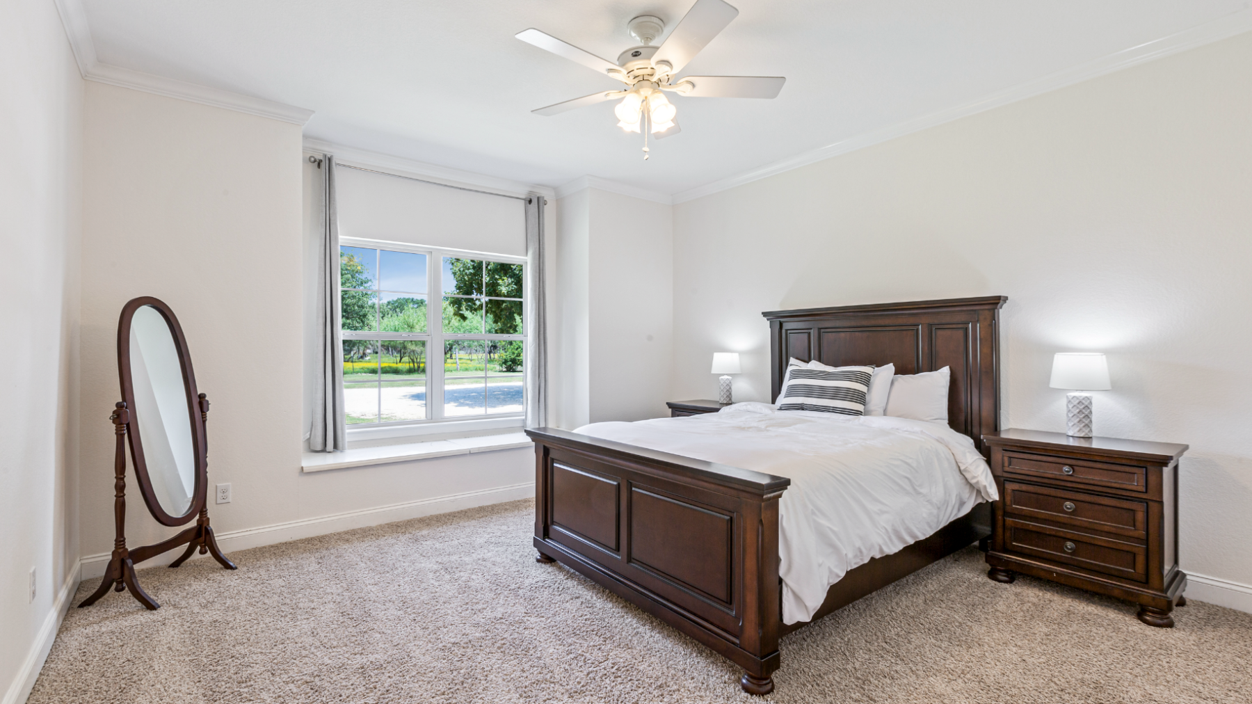 a bedroom with a bed in a room